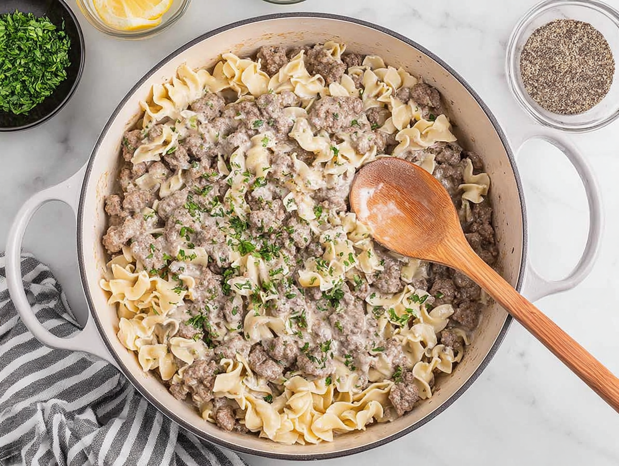 A bowl of creamy 30-minute ground beef stroganoff with egg noodles.